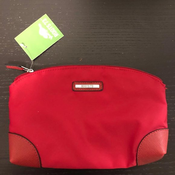 NWT Roots Clutch - Picture 1 of 5